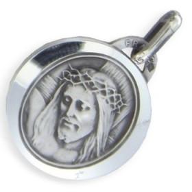 Médaille christ en argent.