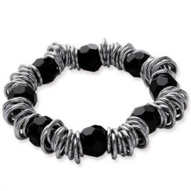 Beau bracelet acier et verre noir.