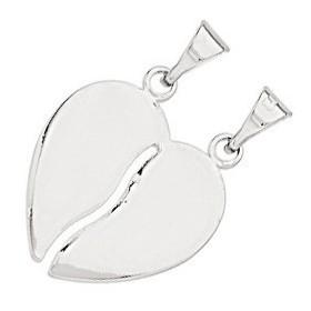 Pendentif coeur à  partager en argent.