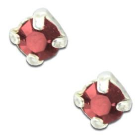 Clous d'oreilles en argent et cristal rouge taille ronde