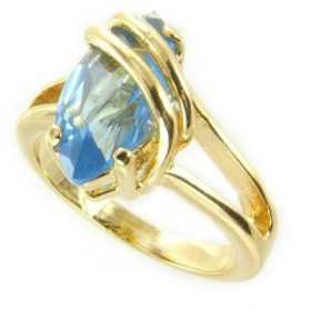 Bague plaqué or avec pierre bleue taille marquise